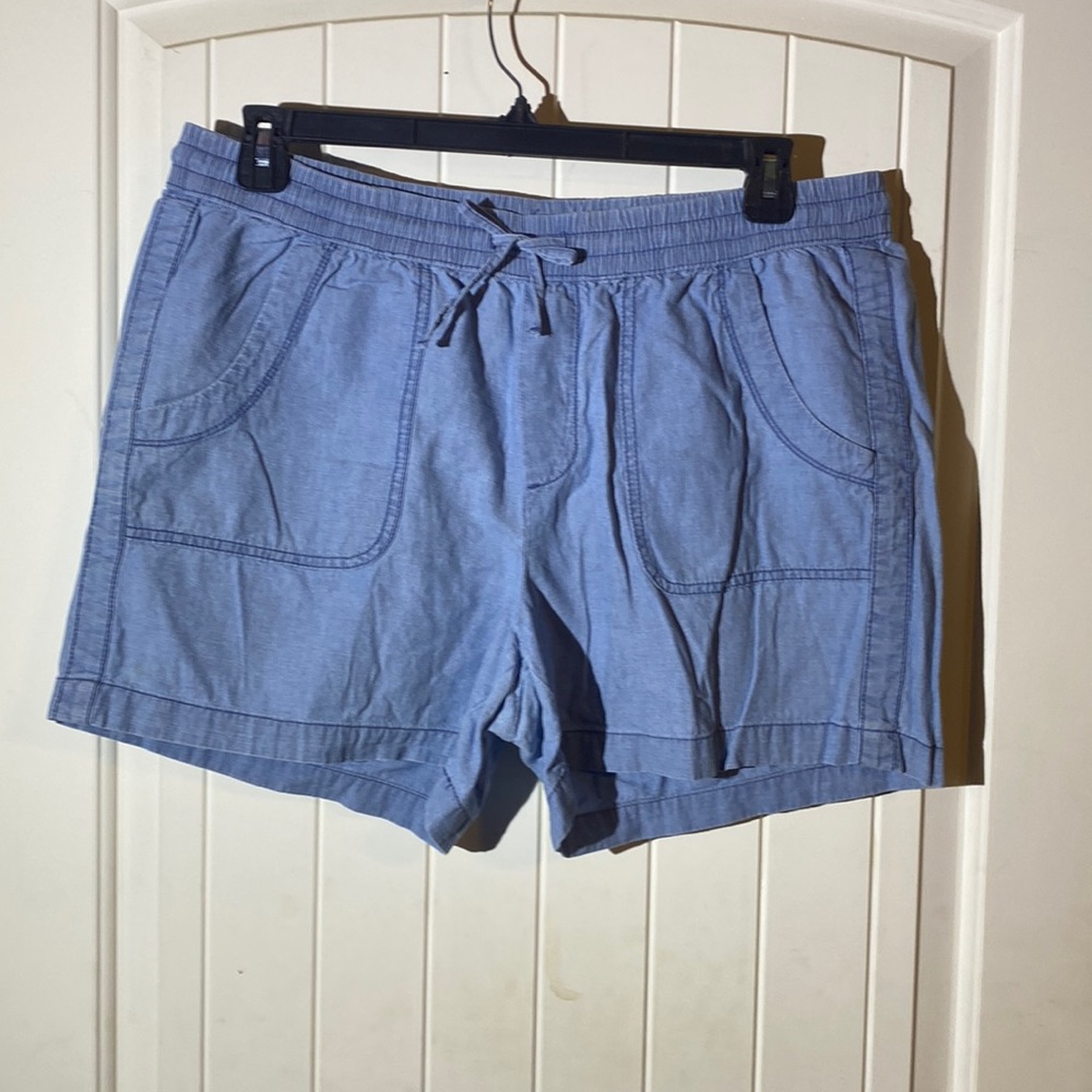 Denim colored shorts.